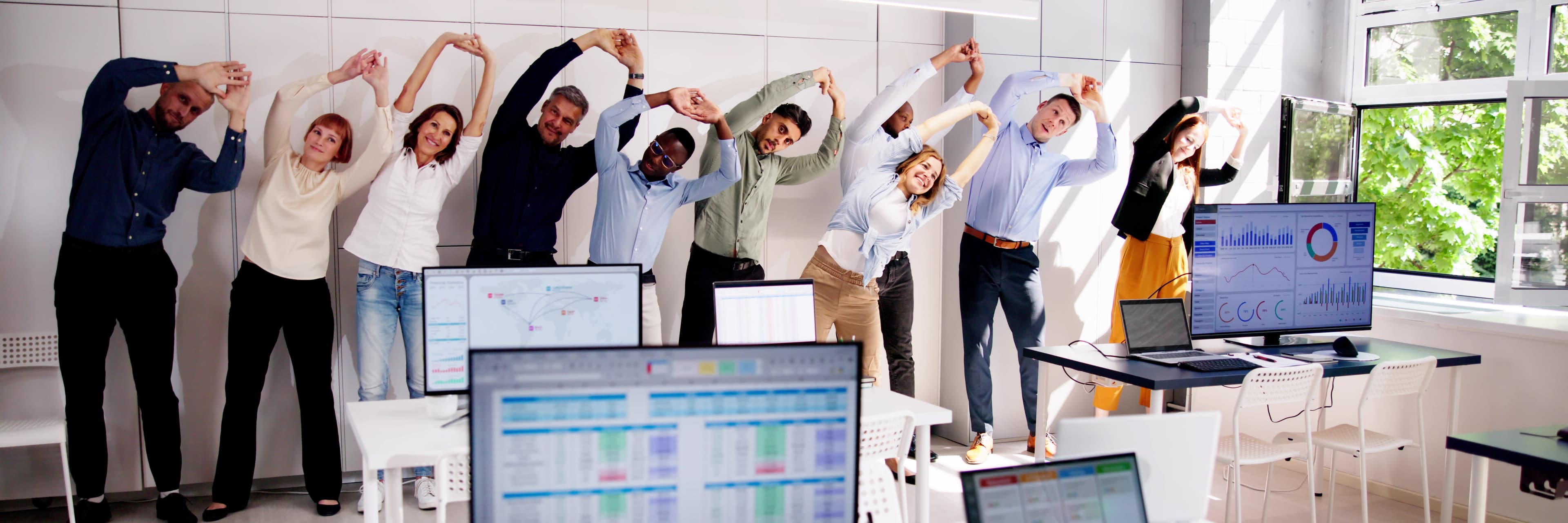 Team practicing coordinated workplace wellness